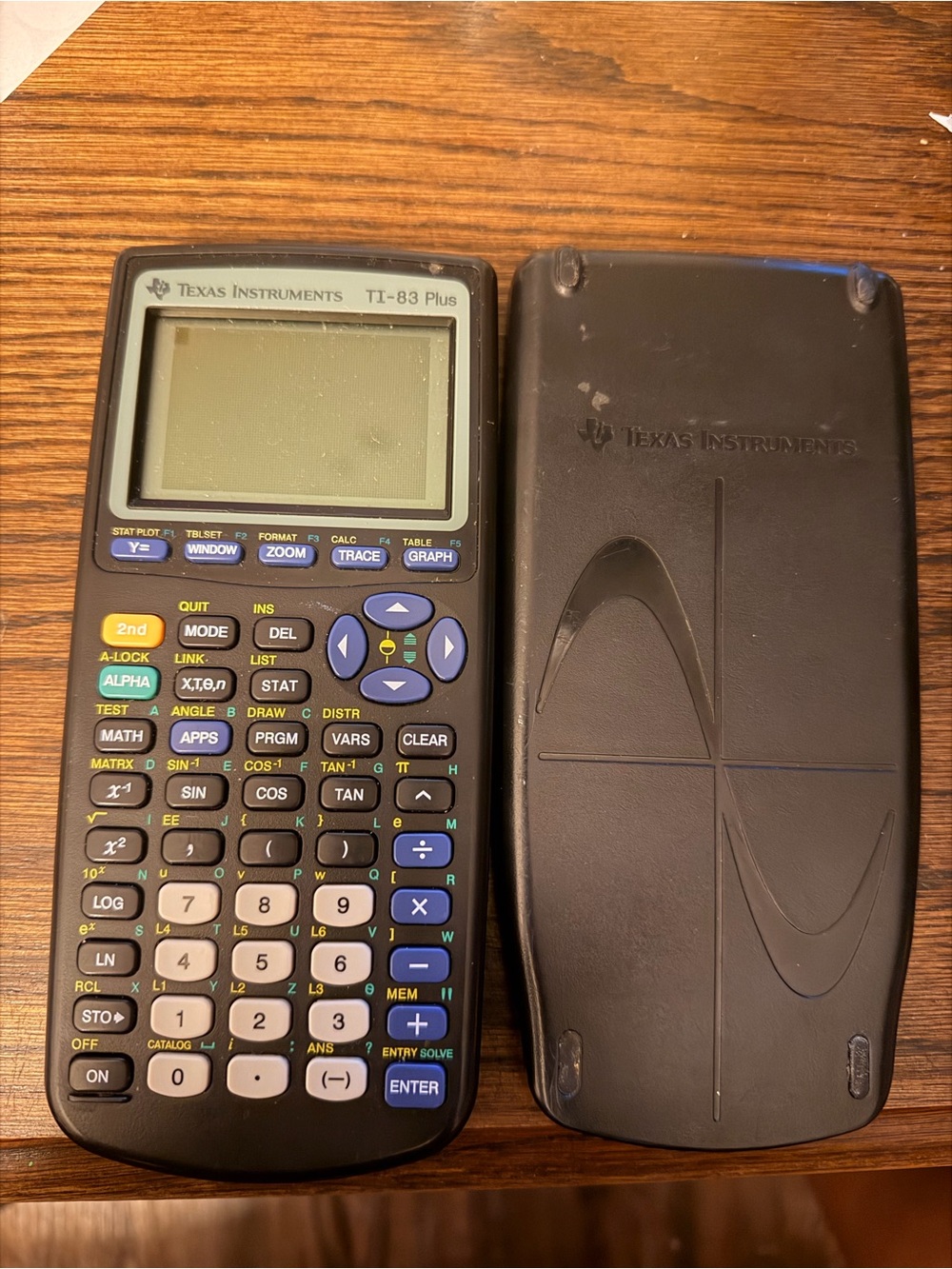 Texas Instruments TI-83 Plus Graphing Calculator - Black with Multi-colored Keys